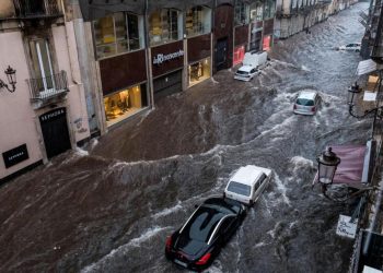 CATANIA, ITALY - OCTOBER 26: The Via Etnea turned into a river due to heavy rainfall on October 26, 2021 in Catania, Italy. Italian authorities issued a red alert for the south of the country after flash floods killed at least two, turned streets into rivers and created a power black-out in Catania. (Photo by Sanne Derks/Getty Images)