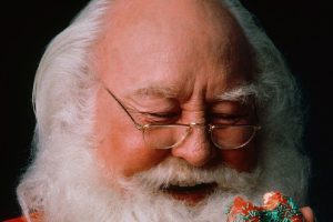 Weihnachtsmann mit Donuts