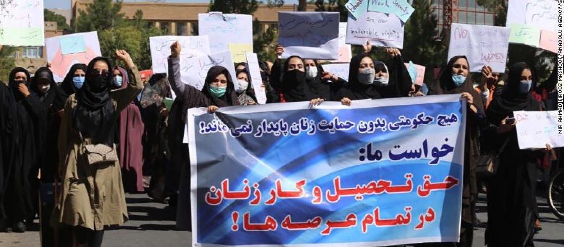 HERAT, AFGHANISTAN - SEPTEMBER 02: A group of women holding banners gather to stage a demonstration for their rights in Herat, Afghanistan on September 02, 2021. (Photo by Mir Ahmad Firooz Mashoof/Anadolu Agency via Getty Images)