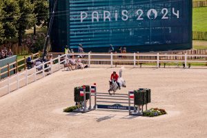 Christian KUKAK (GER) with  CHECKER 47 at the Paris Olympics - Jumping team qualifier.
Photo Copyright © FEI/Liz Gregg