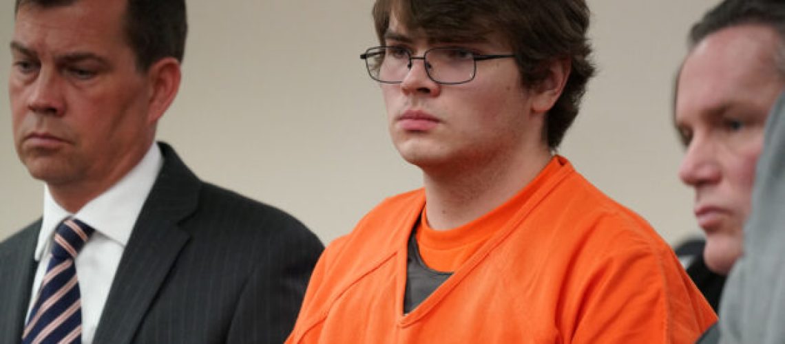 Tops gunman Payton Gendron listens as he is sentenced to life in prison without parole for domestic terrorism motivated by hate and each of the 10 counts of first-degree murder by Erie County Court Judge Susan Eagan, in Buffalo, NY, U.S., February 15, 2023. Derek Gee/Pool via REUTERS