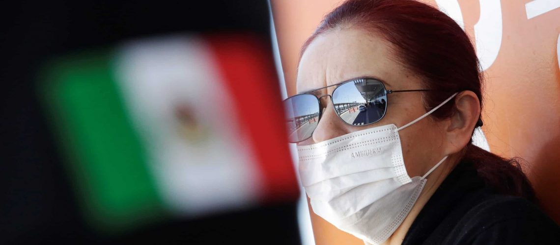 A woman wears a face mask to protect from the coronavirus disease (COVID-19) at Abraham Gonzalez International Airport, in Ciudad Juarez, Mexico March 14, 2020. REUTERS/Jose Luis Gonzalez