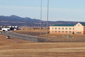 FILE PHOTO: A patrol vehicle is seen along the fencing at the Federal Correctional Complex, including the Administrative Maximum Penitentiary or "Supermax" prison, in Florence, Colorado February 21,2007.  REUTERS/Rick Wilking/File Photo