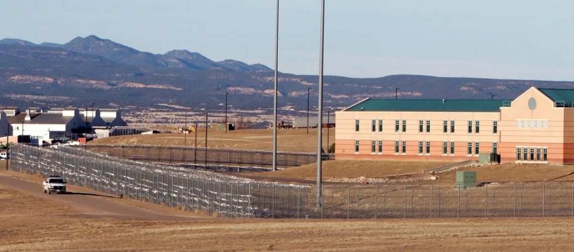 FILE PHOTO: A patrol vehicle is seen along the fencing at the Federal Correctional Complex, including the Administrative Maximum Penitentiary or "Supermax" prison, in Florence, Colorado February 21,2007.  REUTERS/Rick Wilking/File Photo